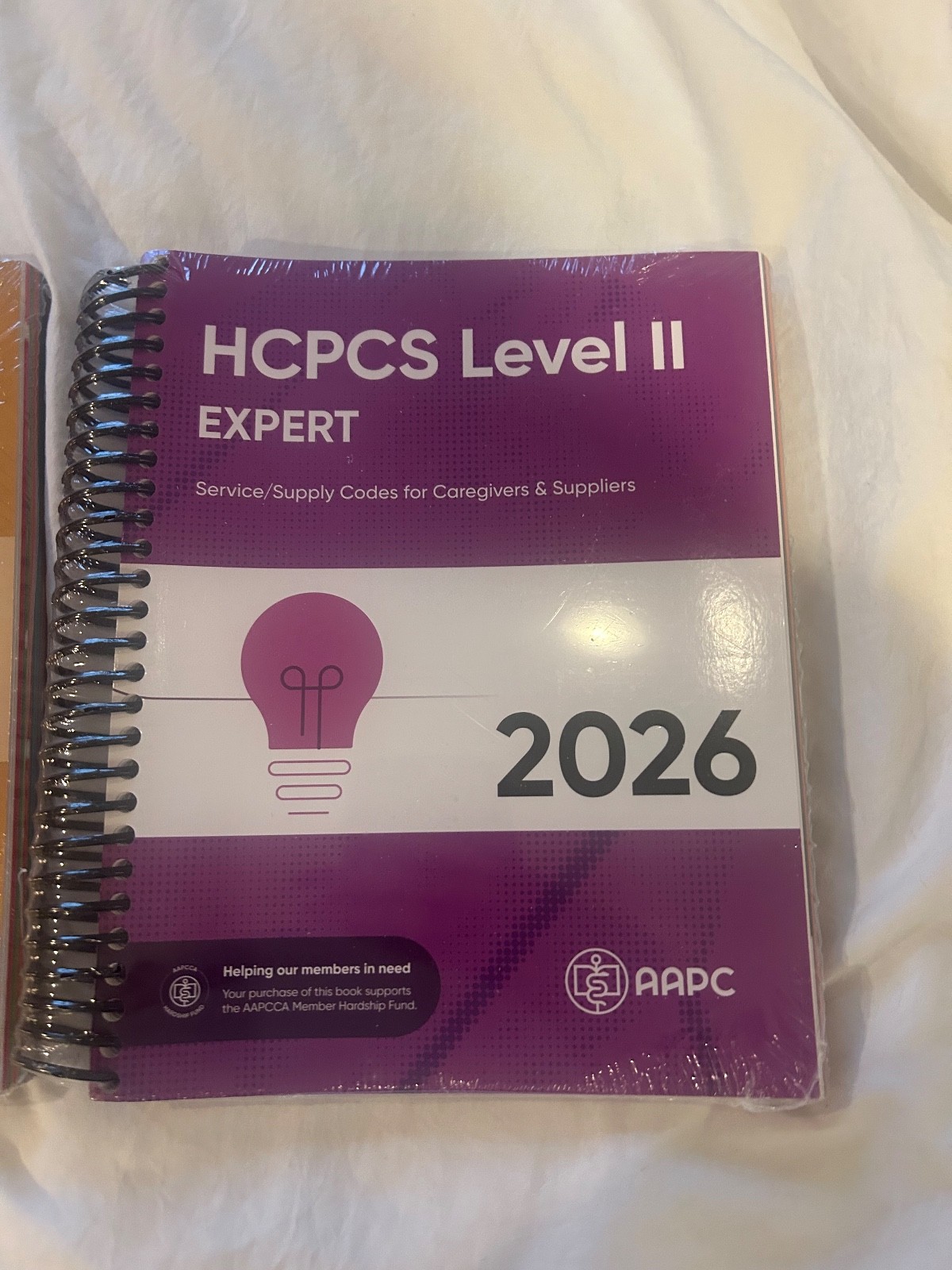 AMA CPT Book, ICD-10 Code Book, HCPCS Book – 2026 Physician Bundle by AAPC NEW