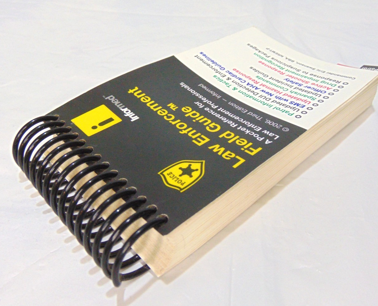 LAW ENFORCEMENT FIELD GUIDE By Informed & Eric Swanson Spiral pocket size