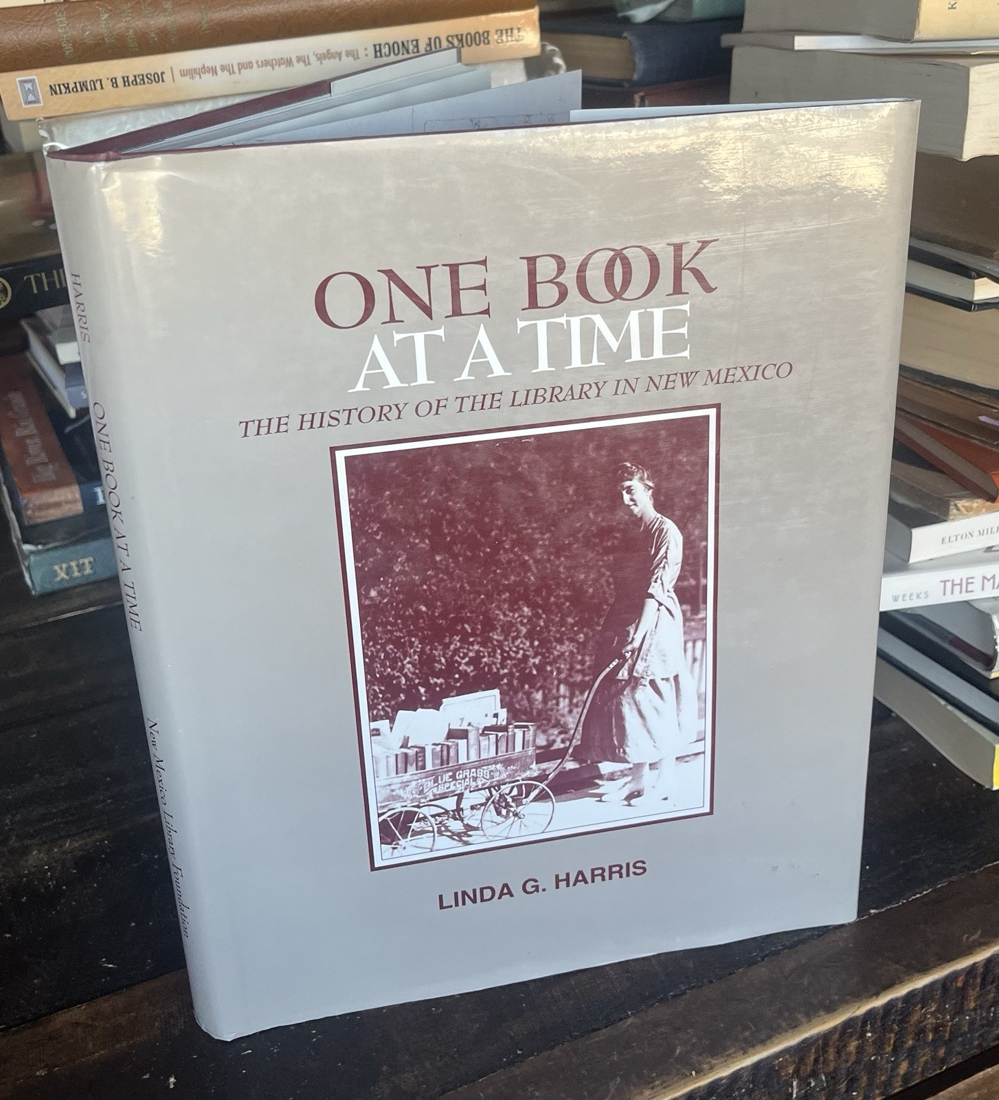 SIGNED One Book at a Time : The History of the Library in New Mexico