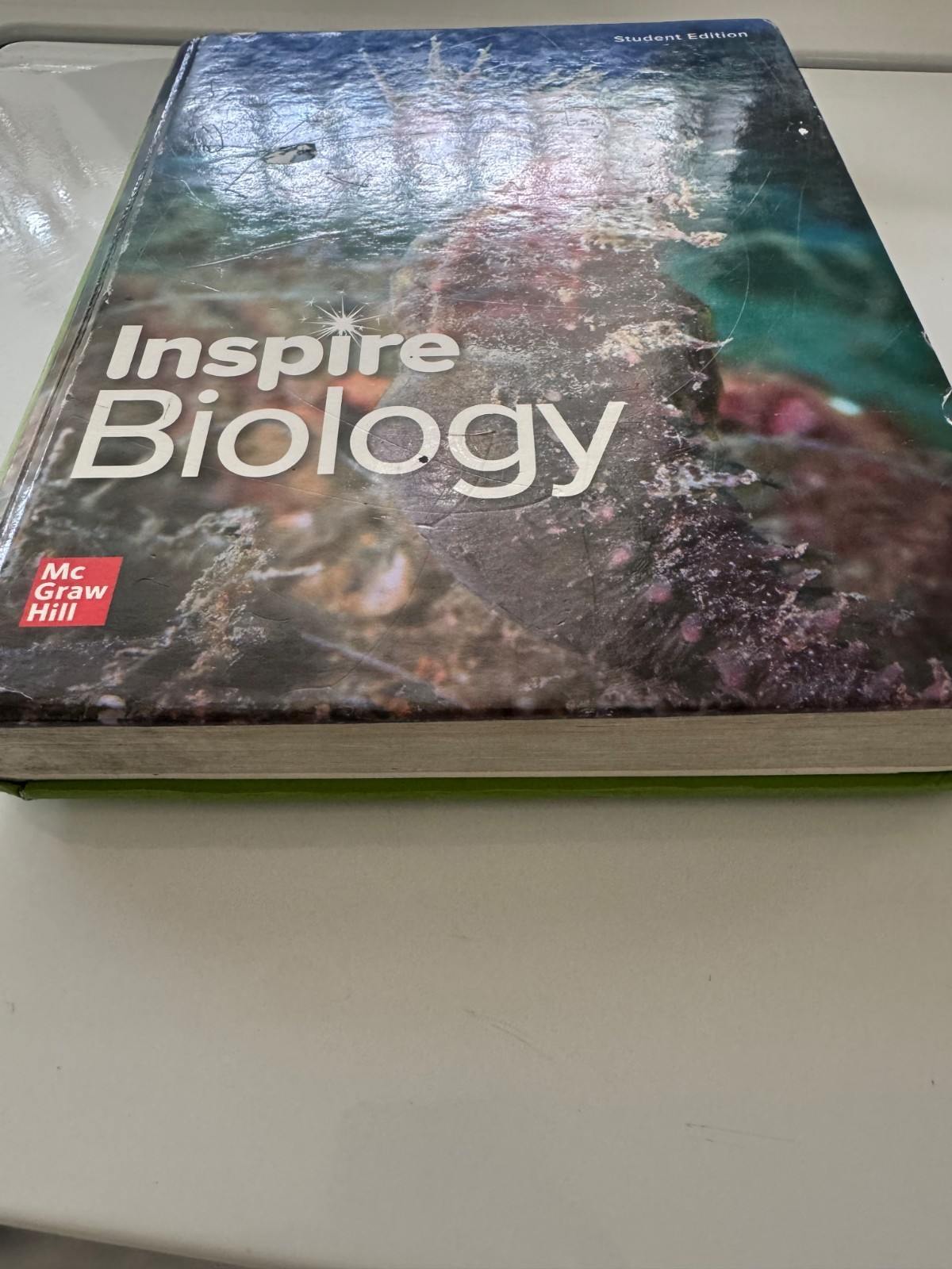 McGraw-Hill Inspire biology, Very good, one slightly ripped page, No doodles,